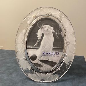 Marquis by Waterford crystal oval frame for a 5 by 7 inch photo.